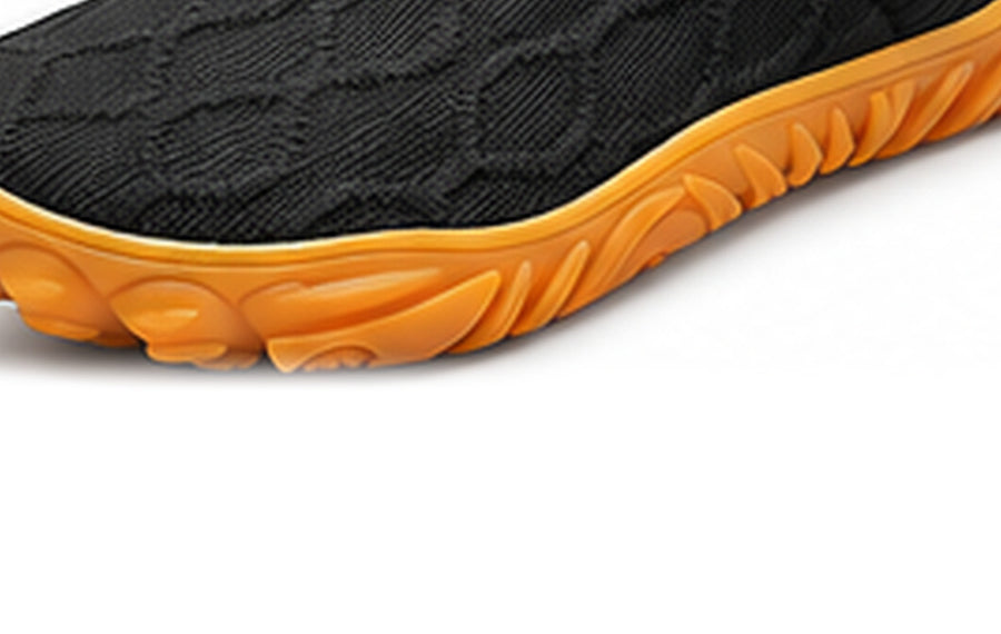 Side view of the textured outsole on a Toeluna walking shoe